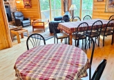 19_DiningAreaTablesTowardsLakeDeckLivingRoomWEB