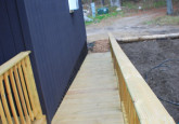 11_HandicapExteriorRampLongViewToDriveway