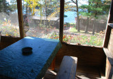 View to lake in shared screened porch of cabins #9 and #10 at Crow Wing Crest Lodge in Akeley, MN