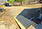 Handicap Ramp To Parking Area at Raspberry Cabin #9, Crow Wing Crest Lodge in Akeley, MN