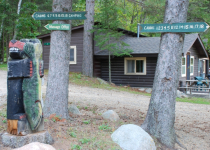 CabinSignsBearStatue