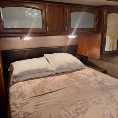 Camper Queen bdrm behind Cabin #8 at Crow wing Crest Lodge, akeley mn