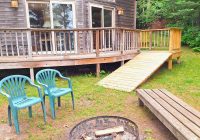 Campfire (private) ring lakeside of Retreat Cabin #19 at Crow Wing Crest Lodge in Akeley, MN